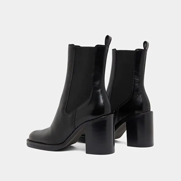 Ankle boots with overflowing heels in black leather