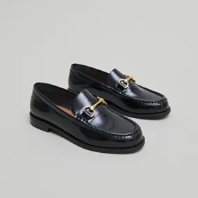 Loafers with gold bits in black leather