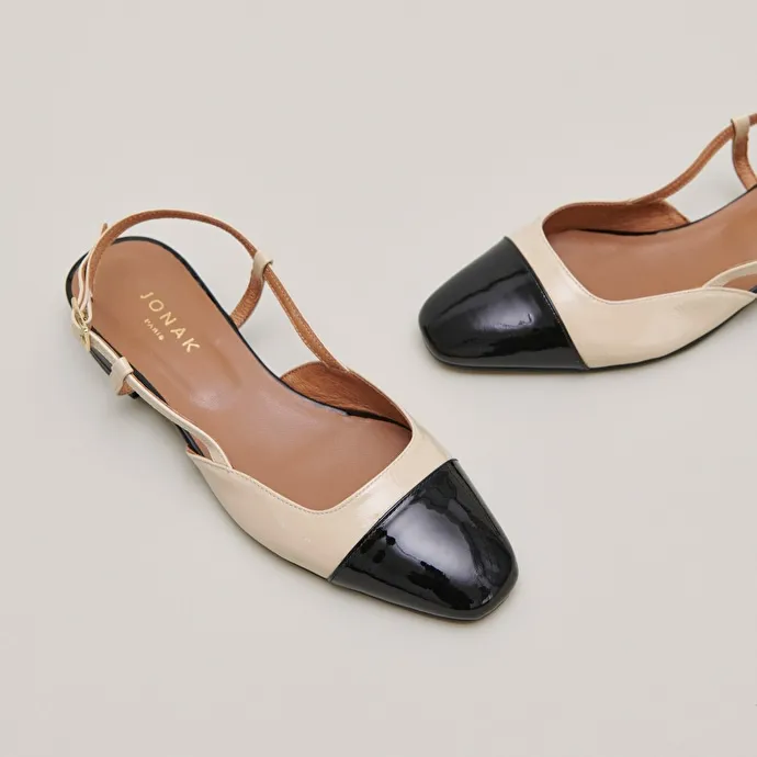 Open back ballet flats in black and beige patent leather